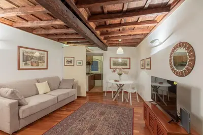 a living room with a couch and a table at iFlat Comfy Apartament in Campo de' Fiori in Rome