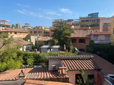 a view of a city with buildings and roofs at CASA PANIERI in Rome