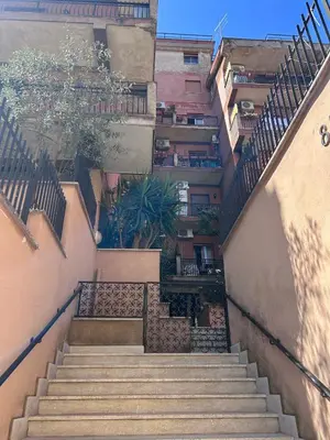 a set of stairs leading up to a building at Magenta Terrione 2 in Rome