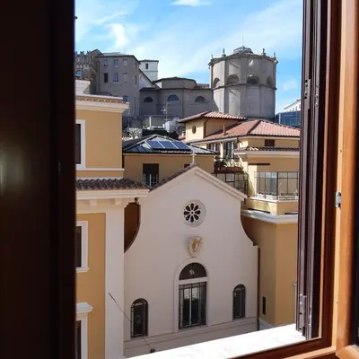 a view of the city from a window at HARMONY RELAX HYDROMASSAGE SAUNA AT THE VATICAN MUSEUMS in Rome
