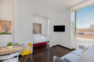 a living room with a couch and a table at Corso View by Rental in Rome in Rome