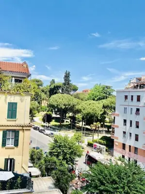 a view of a city street with buildings and trees at Crisalide Apartment in Rome