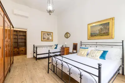 a bedroom with two beds in a room at Ottaviano Suites in Rome