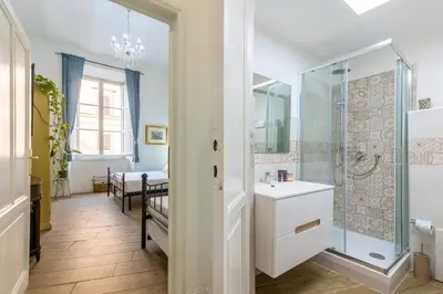 a bathroom with a shower and a sink at Ottaviano Suites in Rome