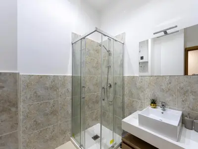 a bathroom with a shower and a sink at (Piazza di spagna)Rome Apartment in Rome