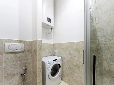 a washer and dryer in a bathroom at (Piazza di spagna)Rome Apartment in Rome