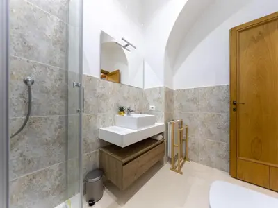 a bathroom with a sink and a shower at (Piazza di spagna)Rome Apartment in Rome
