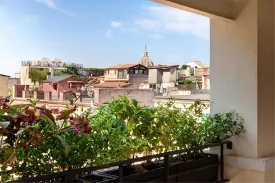 a view of a city from a balcony at TB Place Roma in Rome