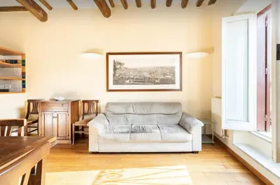 a living room with a couch and a table at Piazza Navona Center House in Rome