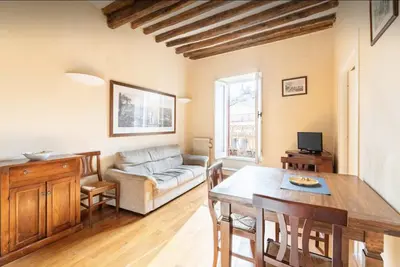 a living room with a couch and a table at Piazza Navona Center House in Rome