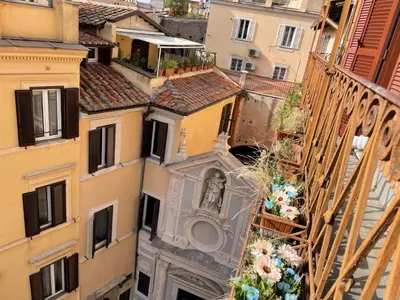an aerial view of a building with a clock tower at Piazza Navona Center House in Rome