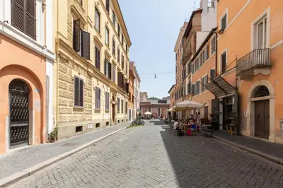 a cobblestone street in a city with buildings at iFlat Blue Cozy Loft near Saint Peter in Rome