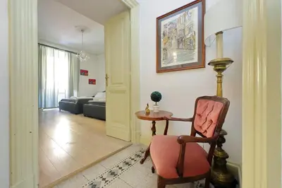 a chandelier hanging from a ceiling in a room at Divine Vatican View Apartment in Rome