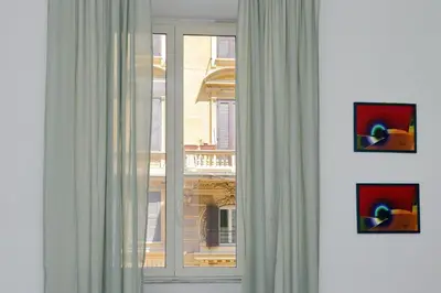 a view from a balcony of a city with buildings at Divine Vatican View Apartment in Rome