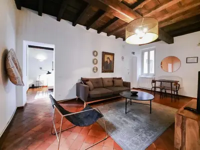 a living room with a couch and a table at EasyTopStay - Castel Sant'Angelo Cosy Flat in Rome
