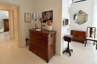a kitchen with a washing machine and a sink at Incanto Italiano in Rome