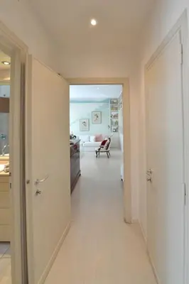 a bedroom with a bed and a chair and a dresser at Incanto Italiano in Rome