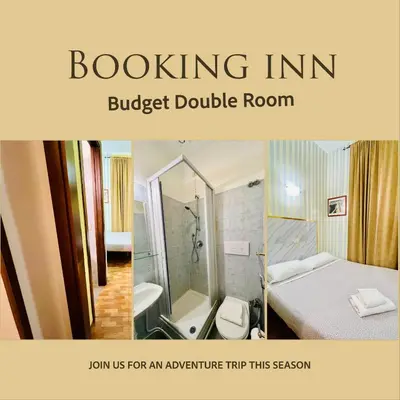 a hotel room with a bed and a shower at Booking Inn Settembre 95 in Rome