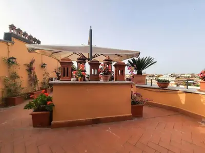 a small shrine on the roof of a building at BrandNew House on the Terrace in Rome