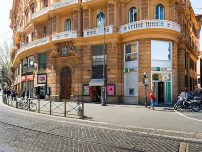 a building on a street in front of a building at Lh Royal Suites Terrace in Rome
