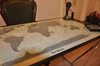 a table with a map of the world on it at Jet Lag Guesthouse in Rome