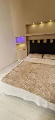 a bedroom with a large bed in a room at Savelli Apartment Old Town - near Navona Place in Rome