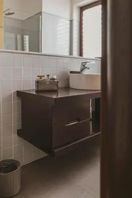 a bathroom with a sink and a mirror at EasyTopStay - Peaceful Retreat near San Pietro in Rome