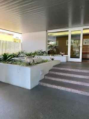a building with stairs in front of a building at Giulio Cesare Holiday House in Rome