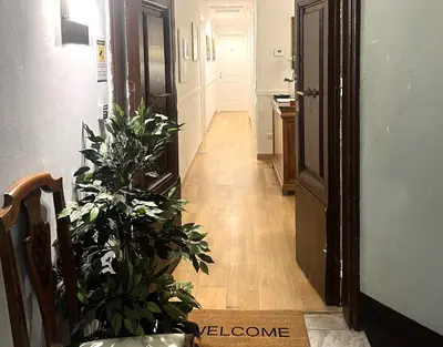 a hallway with some plants in a room at INTERNO ROMA in Rome