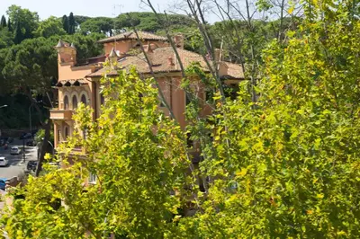 a house in the middle of some trees at Trastevere Belvedere B&B in Rome