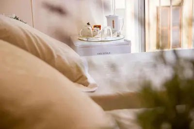a close up of a bed with a window at Trastevere Belvedere B&B in Rome