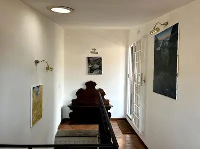 a staircase in a room with a stair case at Giglio Penthouse and Terrace in Rome