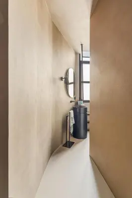 a bathroom with a sink and a mirror on the wall at Charm and Elegance by The Spanish Steps in Rome