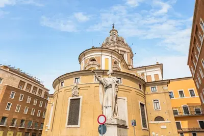 a building with a statue on the side of it at Charm and Elegance by The Spanish Steps in Rome