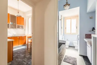 a bathroom with a sink and a toilet in a room at Campo de Fiori Large and Beautiful Apartment in Rome