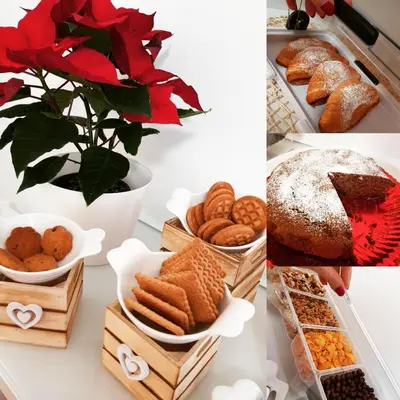 a table topped with different types of bread and cookies at Rose Antiche Vatican B&B in Rome