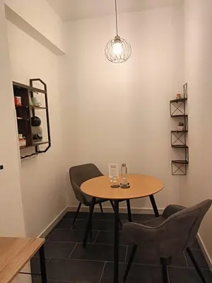 a dining room with a table and chairs at Rose Antiche Vatican B&B in Rome