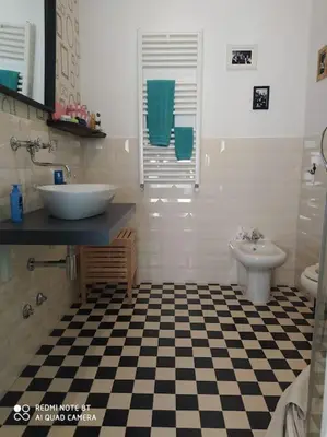 a bathroom with a sink and a toilet at Vanity Apartment - 4 bedrooms with 4 bathrooms - AC & WIFI in Rome