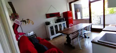 a kitchen with a table and a dining room at Vanity Apartment - 4 bedrooms with 4 bathrooms - AC & WIFI in Rome
