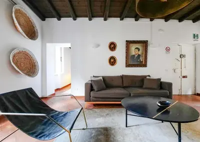 a living room with a couch and a table at EasyTopStay - Cosy Flat near Castel S Angelo in Rome