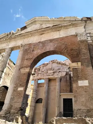 an arch in the ruins of a building at Attico con terrazza Santa Cecilia in Rome