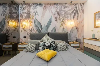 a bedroom with a bed with pillows on it at SolferinoNove in Rome