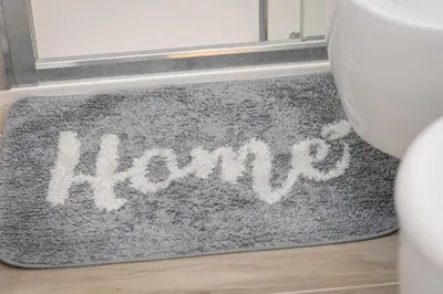 a door mat with the word karma written on it at SolferinoNove in Rome