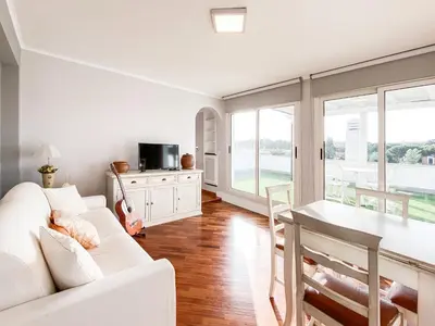a living room with a white couch and a table at Al 13 - La Terrazza in Rome