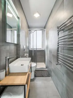 a bathroom with a tub and a toilet and a sink at Al 13 - La Terrazza in Rome