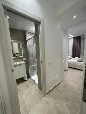 a bathroom with a sink and a mirror at Bobbio Holiday Rome in Rome