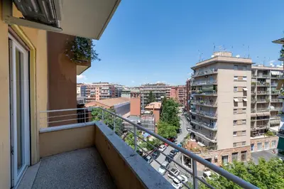 a balcony with a view of a city at Casa Tripolitania in Rome