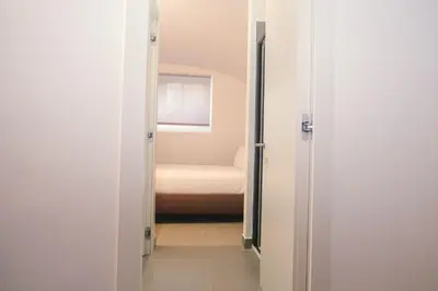 a small room with a bed and a window at Youroom Monteverde - Rooms in Rome