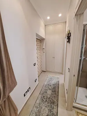 a bathroom with a shower and a walk in closet at Suite della Vite 27 in Rome