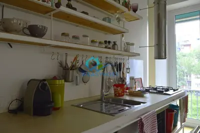 a kitchen with a sink and a counter top at Cozy Design Flat - Trastevere in Rome